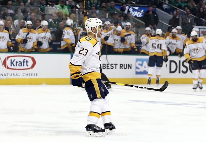 Nashville Predators center Rocco Grimaldi (23) celebrates his goal against the Dallas Stars in the second period of Game 3 in an NHL hockey first-round playoff series in Dallas, Monday, April 15, 2019. (AP Photo/Tony Gutierrez)

