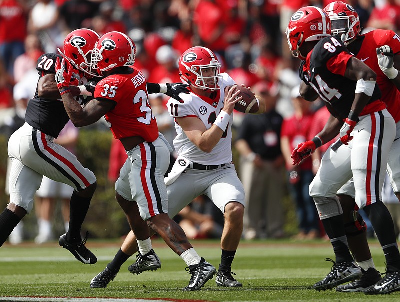 Georgia quarterback Jake Fromm looks for an open receiver during last year's G-Day game at Sanford Stadium in Athens. The Bulldogs have had notable turnouts at their three spring games since Kirby Smart took over as coach.