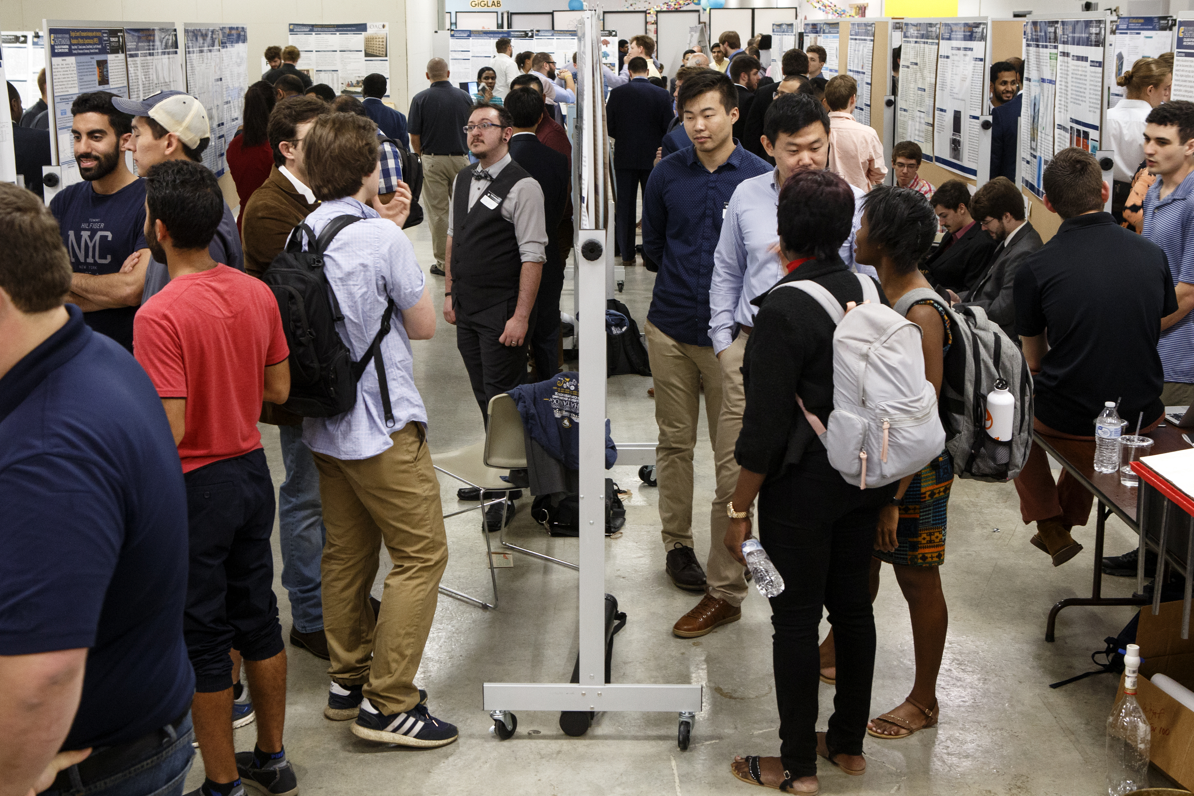 People view the displays during the University of Tennessee at Chattanooga College of Engineering and Computer Science's Technology Symposium at the downtown Public Library on Thursday, April 18, 2019 in Chattanooga, Tenn.