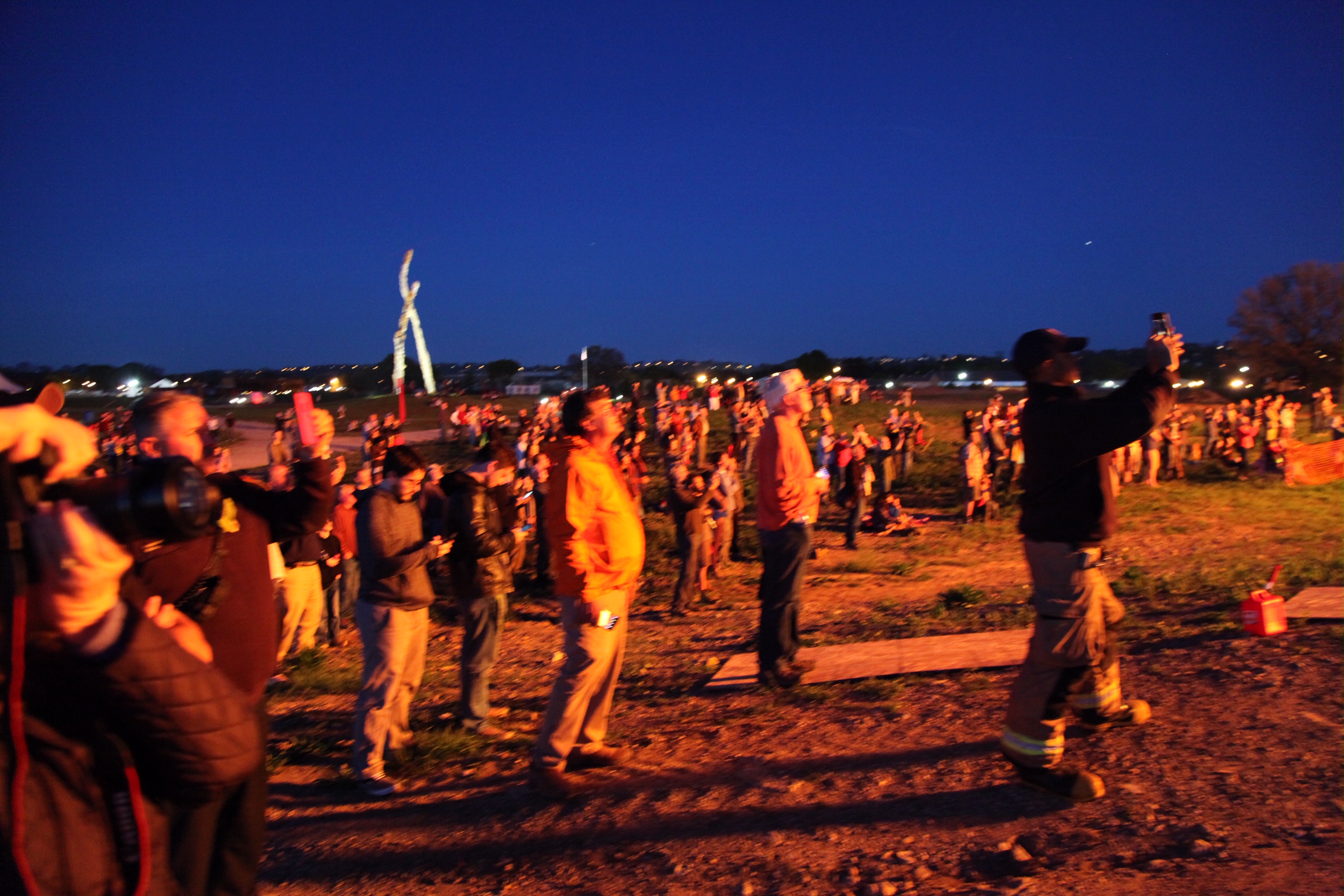 The crowd at last year's Spring Into Sculpture gathers for the sculpture burn. / Sculpture Fields photo