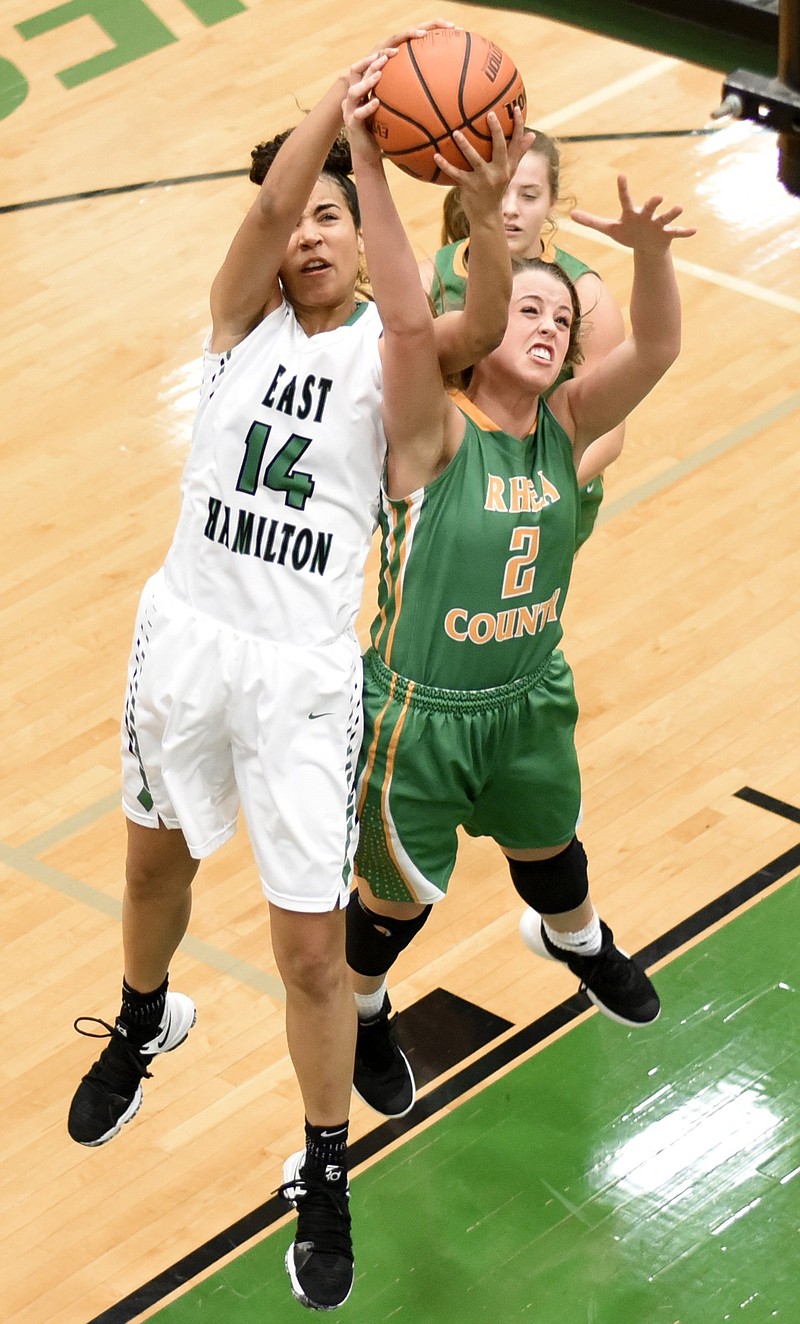 East Hamilton's Madison Hayes (14) fights for a rebound with Rhea County's Haley Cameron in February. Hayes went on to become Tennessee's Class AAA Miss Basketball and win a 3-on-3 national championship.