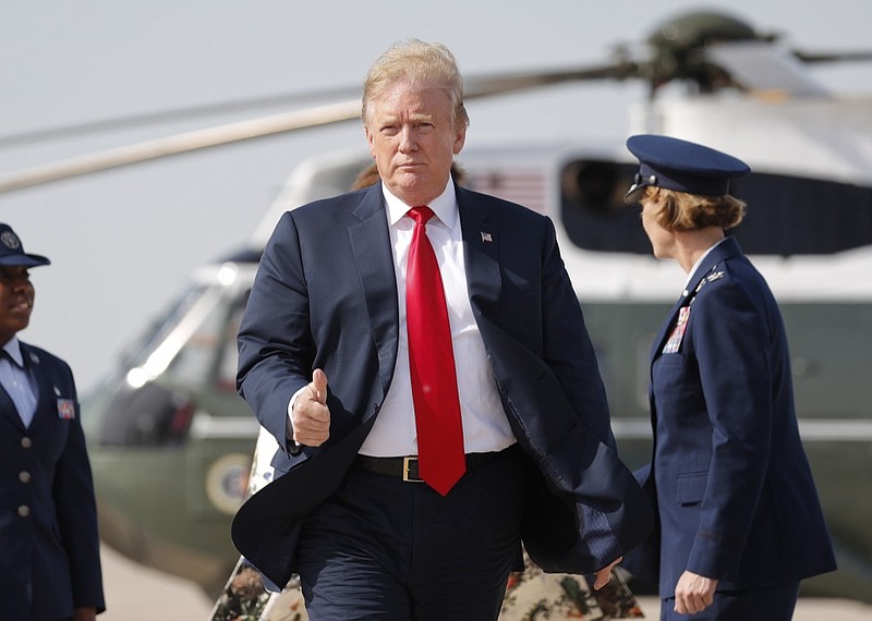 President Donald Trump gives a 'thumbs-up' as he prepares to board Air Force One, Thursday, April 18, 2019, at Andrews Air Force Base, Md. President Trump is traveling to his Mar-a-lago estate to spend the Easter weekend in Palm Beach, Fla. (AP Photo/Pablo Martinez Monsivais)

