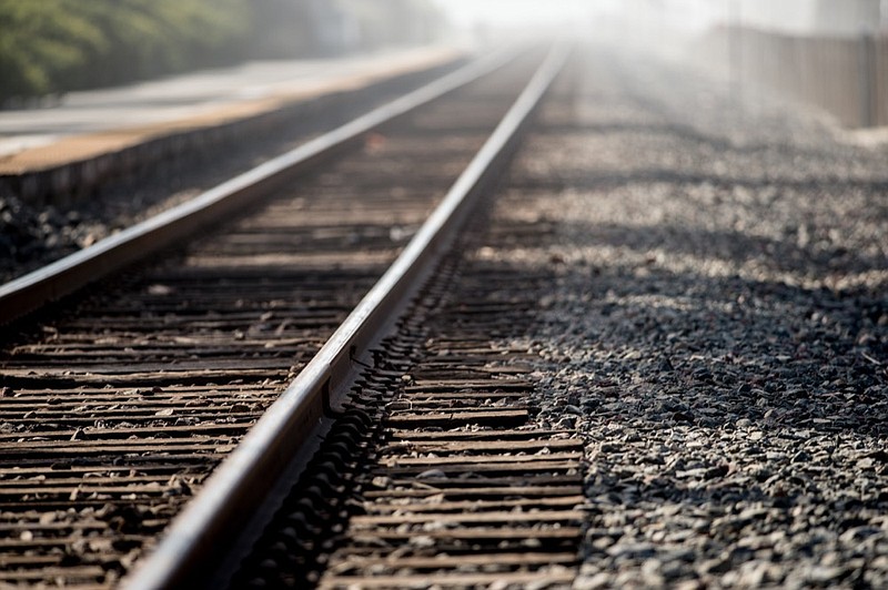 
railroad tracks fading into the distance railroad tile train / Getty Images