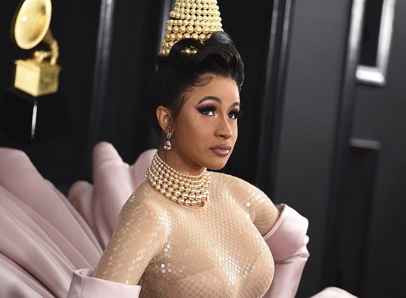 FILE - This Feb. 10, 2019 file photo shows Cardi B at the 61st annual Grammy Awards in Los Angeles. According to WNBC she was in a New York court room on Friday, April 19, 2019 where she rejected a plea deal in a case stemming from a New York strip club melee in the fall of 2018. (Photo by Jordan Strauss/Invision/AP, File)

