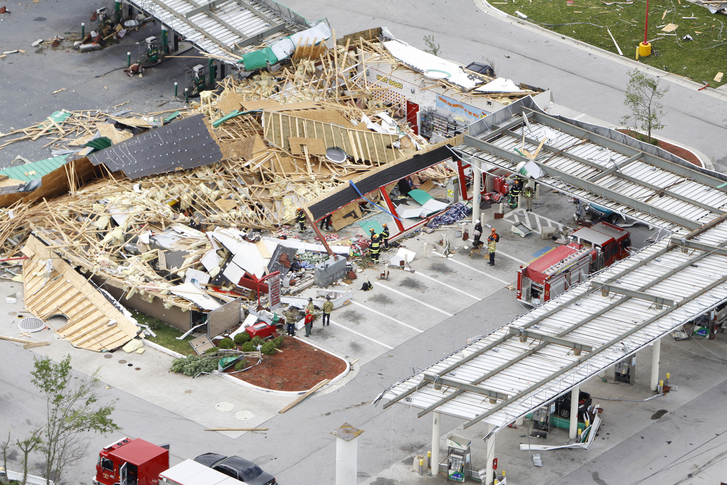 Staff photo by Dan Henry/Chattanooga Times Free Press - April 28, 2011. Emergency personnel perform search and rescue efforts at the BP gas station in downtown Ringgold, Ga., after overnight storms produced what is thought to be numerous tornadoes which touched down throughout the North Georgia and Chattanooga area Wednesday evening.