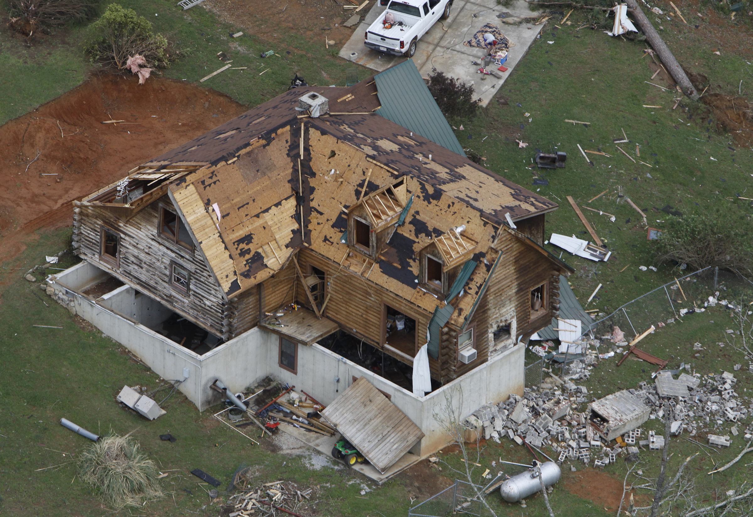 Staff photo by Dan Henry/Chattanooga Times Free Press - April 28, 2011. A Ringgold, Ga., is moved off of it's foundation near Cherokee Valley Rd., after overnight storms produced what is thought to be numerous tornadoes which touched down throughout the North Georgia and Chattanooga area Wednesday evening.
