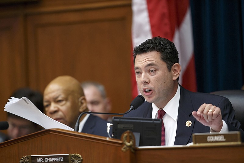 FILE - In this Sept. 30, 2014, file photo, House Oversight Committee member Rep. Jason Chaffetz, R-Utah, leads the questioning of then-Secret Service Director Julia Pierson as the committee examines details surrounding a security breach at the White House on Capitol Hill in Washington. The committee's ranking member Rep. Elijah Cummings, D-Mid. is at left. Capitol Hill lawmakers investigating the Secret Service say they want to look into moving it out of the Homeland Security Department and back into the Treasury Department. Secret Service was part of the Treasury up until the Homeland Security Department was created after the 9/11 terror attacks.   (AP Photo/J. Scott Applewhite)