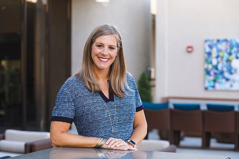 Cindy Monroe, who started the company Thirty-One Gifts headquartered in Columbus, Ohio, poses for a portrait at the Westin Hotel. Monroe is a UTC graduate who was inducted into the business school's hall of fame.