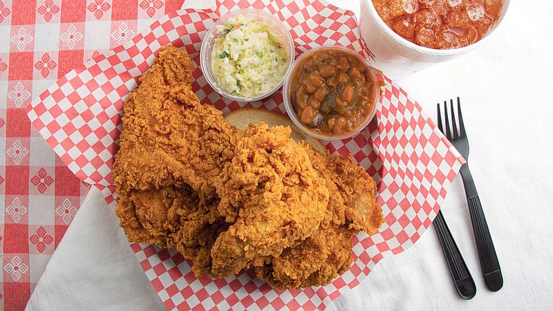 Champy's three-piece fried chicken plate with beans and cole slaw. / Contributed photo from Champy's