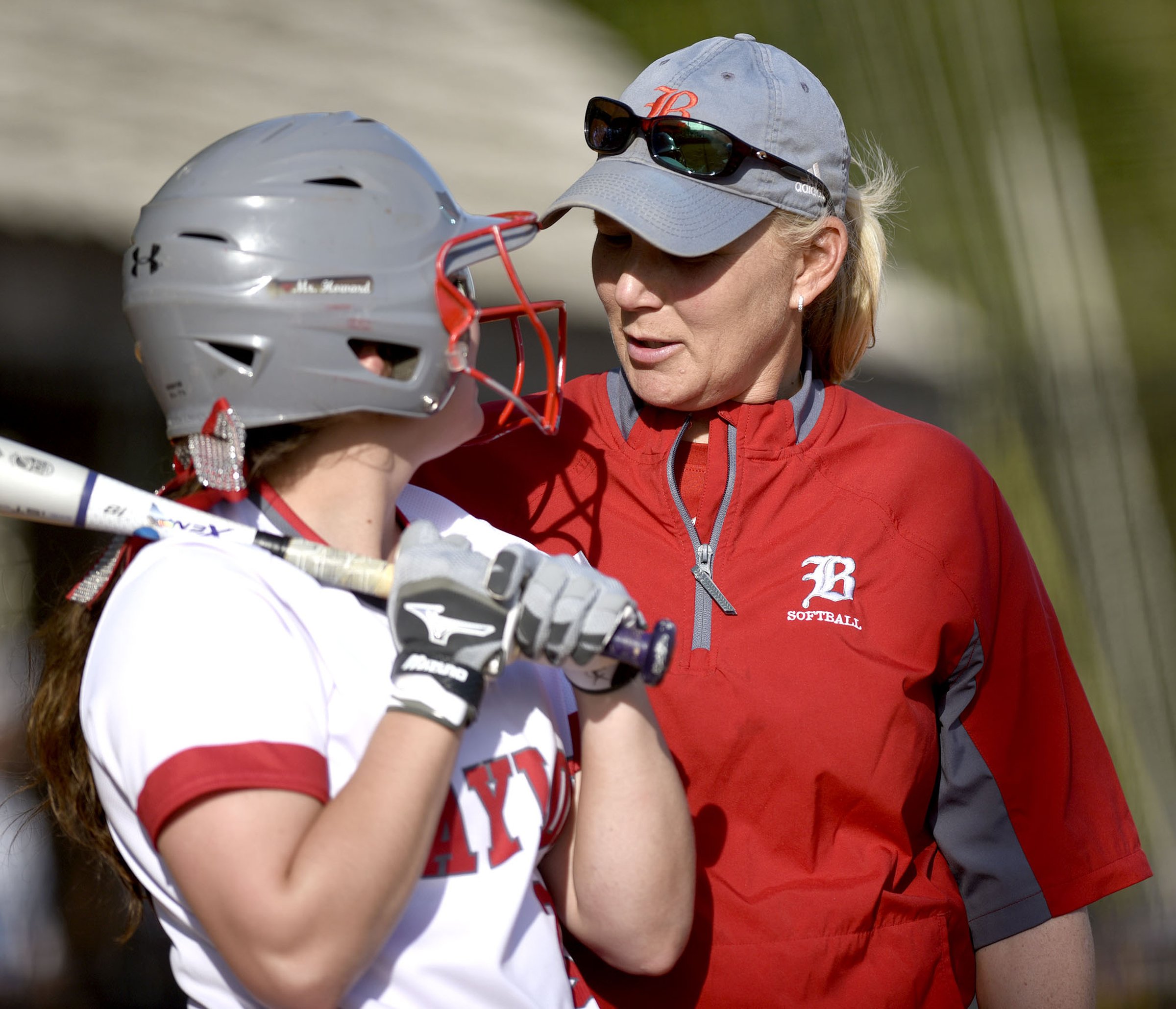 Baylor head coach Kelli Smith confers with batter Sophie Piskos (23). The Baylor Lady Raiders visited the Girls Preparatory School Bruisers in TSSAA softball action. The Bruisers won 5 to 0.