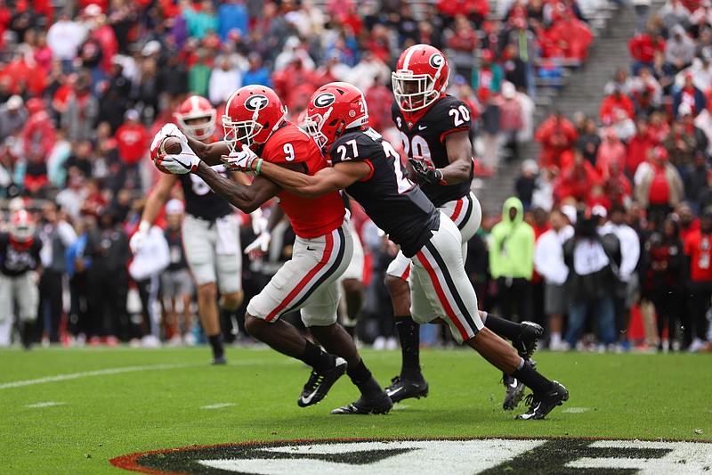 Georgia receiver Jeremiah Holloman (9) runs the ball during the G-Day Game in Sanford Stadium in Athens, Ga., on Saturday, April 20, 2019. (Photo by Lauren Tolbert)