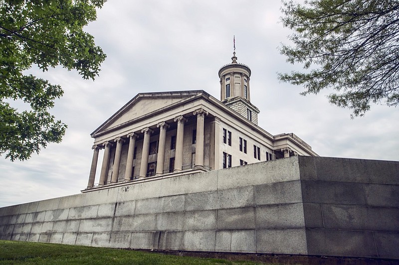 The Tennessee state capitol building is located in Nashville, at the intersection of Charlotte Avenue and 7th Avenue North. It occupies the highest point in Nashville, a hill once known at Cedar Knob. The structure was designed by architect William Strickland who is buried at the north façade of the capitol building.
 state capitol tennessee house of representatives / Getty Images
