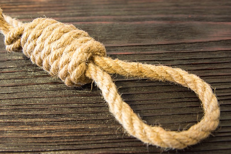 The deadly loop of rope. Last seconds of life. Unrequited love. lynching lynch / Getty Images