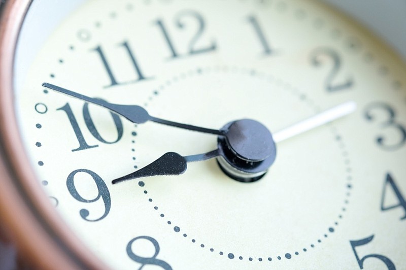 The image of the alarm clock face nine o'clock. clock tile / Getty Images