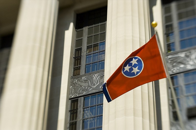 Tennessee Flag on Courthouse tn flag tennessee state tile court government building / Getty Images