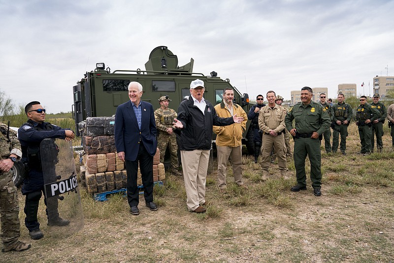 President Donald Trump with Republican leaders at the Rio Grande in McAllen, Texas, last January. (Doug Mills/The New York Times)