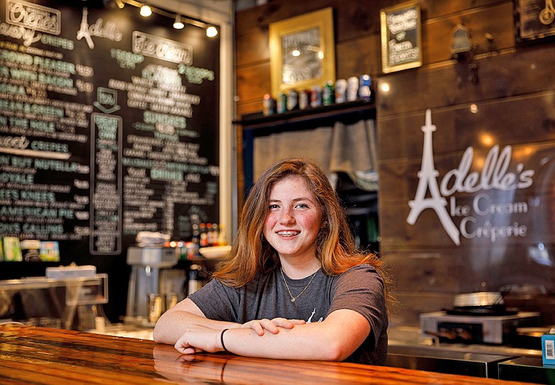 Adelle Pritchard poses for a portrait at her business Adelle's Ice Cream and Creperie inside the Granfalloon on Main Street on Tuesday, April 9, 2019. Pritchard started the crepe and ice cream shop when she was twelve years old. (Staff photo by Doug Strickland)