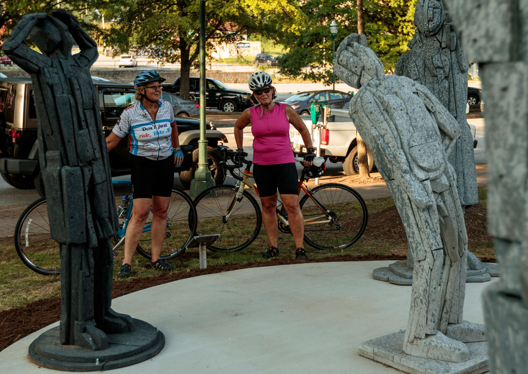 Lory Heron, left, and Jenise Gordon look at a sculpture titled