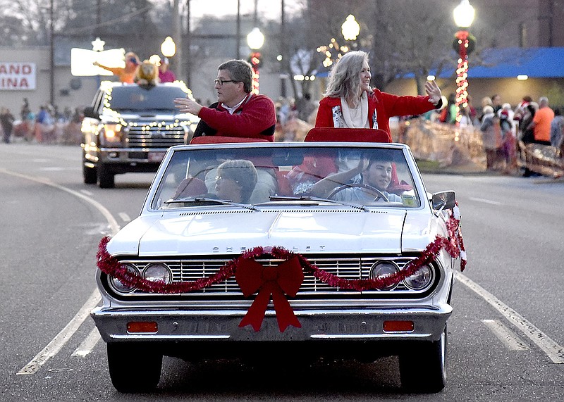 Hamilton County Commissioner Joe Graham and wife, Letitia, ride down Dayton Blvd. in a classic Chevrolet.  The Red Bank Christmas Parade and Celebration was held at the City Park on Dec. 2, 2017.