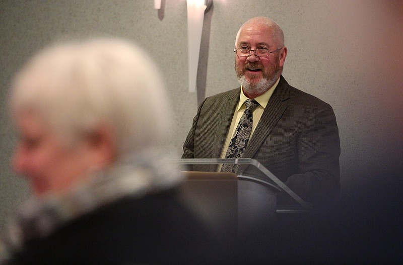 Staff photo by Erin O. Smith / Criminal Court Clerk Vince Dean speaks about clerk fees and e-filings in criminal cases during a legislative breakfast Jan. 4, 2018 at the Doubletree Hotel in Chattanooga.