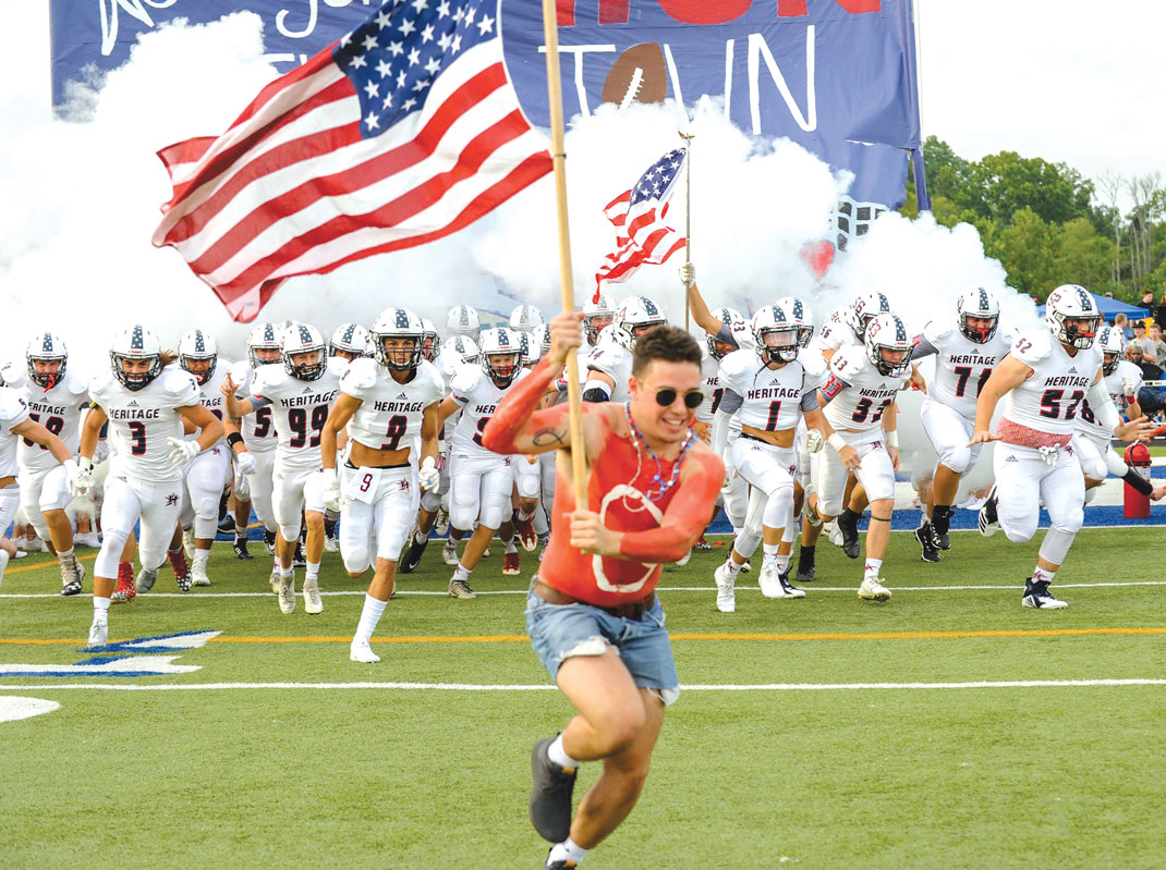 The Heritage High football team takes the field as they face off with rival Ringgold High on Aug. 24, 2018. / File photo