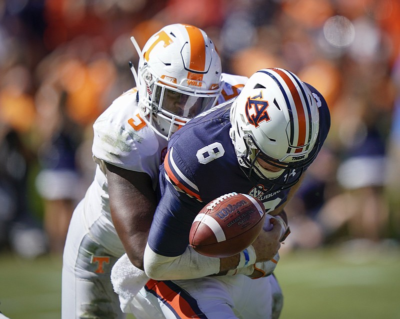 Tennessee defensive end Kyle Phillips sacks Auburn quarterback Jarrett Stidham during the visiting Vols' upset of the 21st-ranked Tigers this past October. Stidham fumbled on the play, with Alontae Taylor returning it for a touchdown.