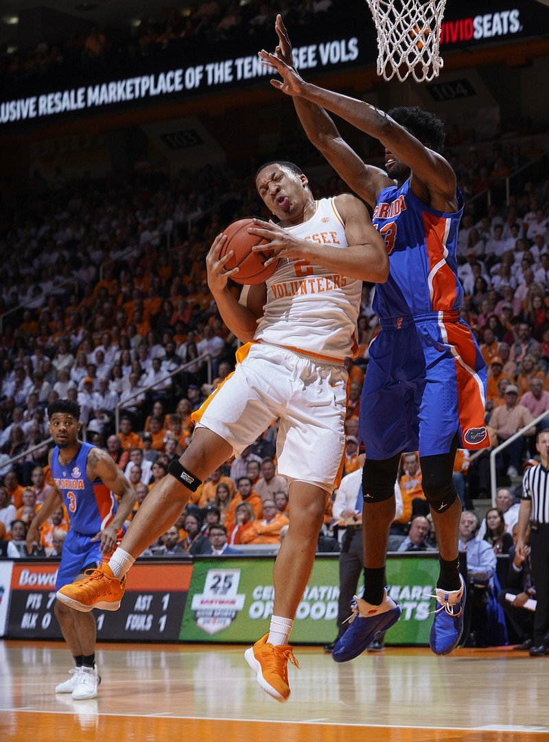 Tennessee forward Grant Williams, left, was named SEC player of the year the past two seasons, but he has made himself available for the NBA draft and may not be back for his senior year.