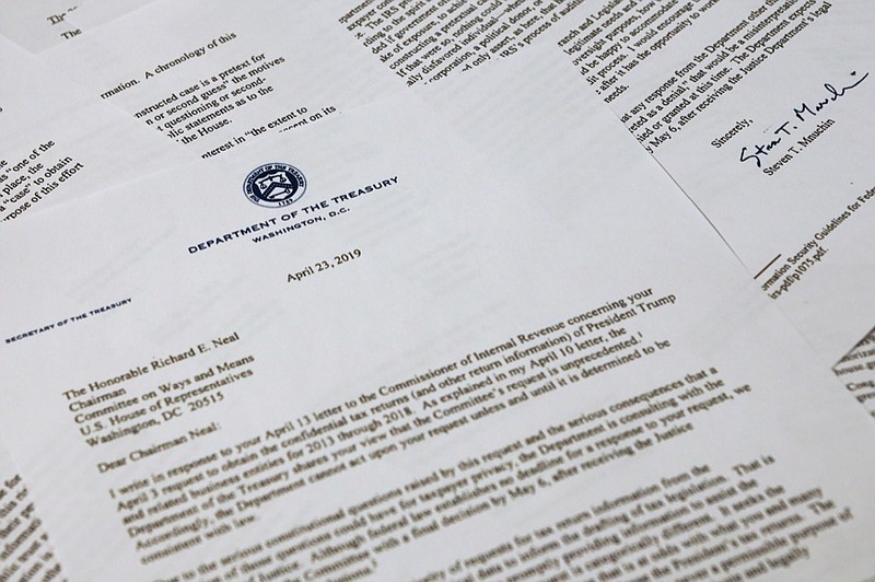The letter from Treasury Secretary Steven Mnuchin to House Ways and Mean chairman Richard Neal of Mass., is photographed Tuesday, April 23, 2019, in Washington. Mnuchin is asking for more time to respond to House Democrats' request for President Donald Trump's tax returns. (AP Photo/Jon Elswick)

