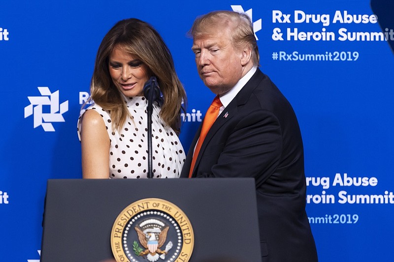 President Donald Trump and first lady Melania Trump arrive to speak during the RX Drug Abuse and Heroin Summit, Wednesday, April 24, 2019, in Atlanta. (AP Photo/John Amis)