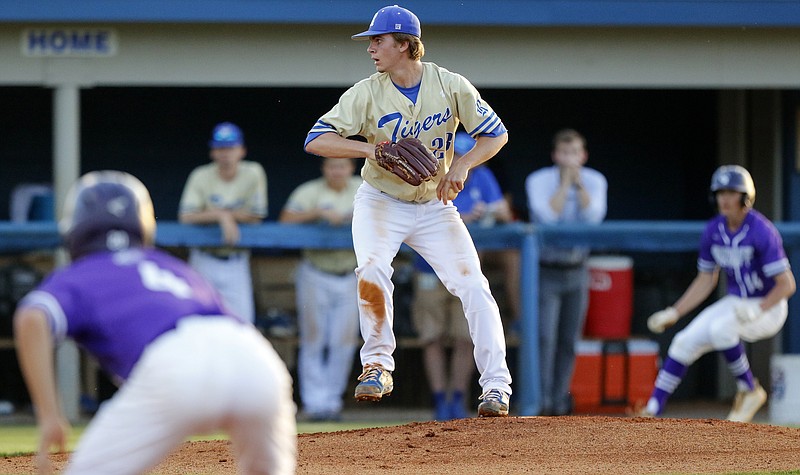 Ringgold's Wyatt Tennant pitches with the bases loaded during the second game of a doubleheader against Cherokee Bluff on Wednesday at Bill Womack Field in Ringgold, Ga. Ringgold is hosting the Flowery Branch school in a best-of-three series in the first round of the GHSA Class AAA state playoffs, and they split Wednesday's meetings, setting up a deciding game Thursday in Ringgold.