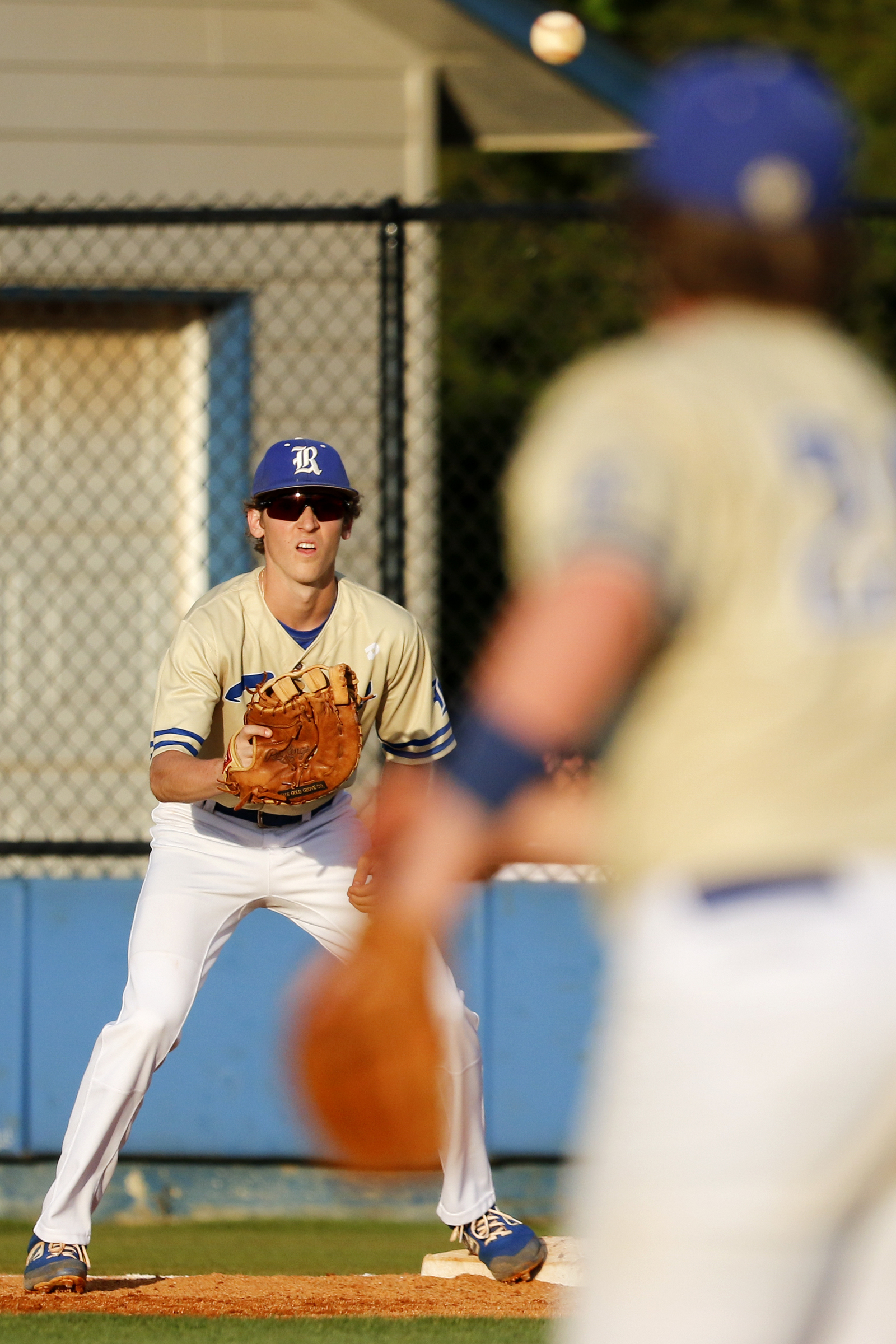Ringgold's Johnny Camillucci waits for the ball to get to him from teammate Daulton Schley to make an out at first base during the second game of a double header in the first round of the GHSA playoffs against Cherokee Bluff at Bill Womack Field at Ringgold High School on Wednesday, April 24, 2019 in Ringgold, Ga.