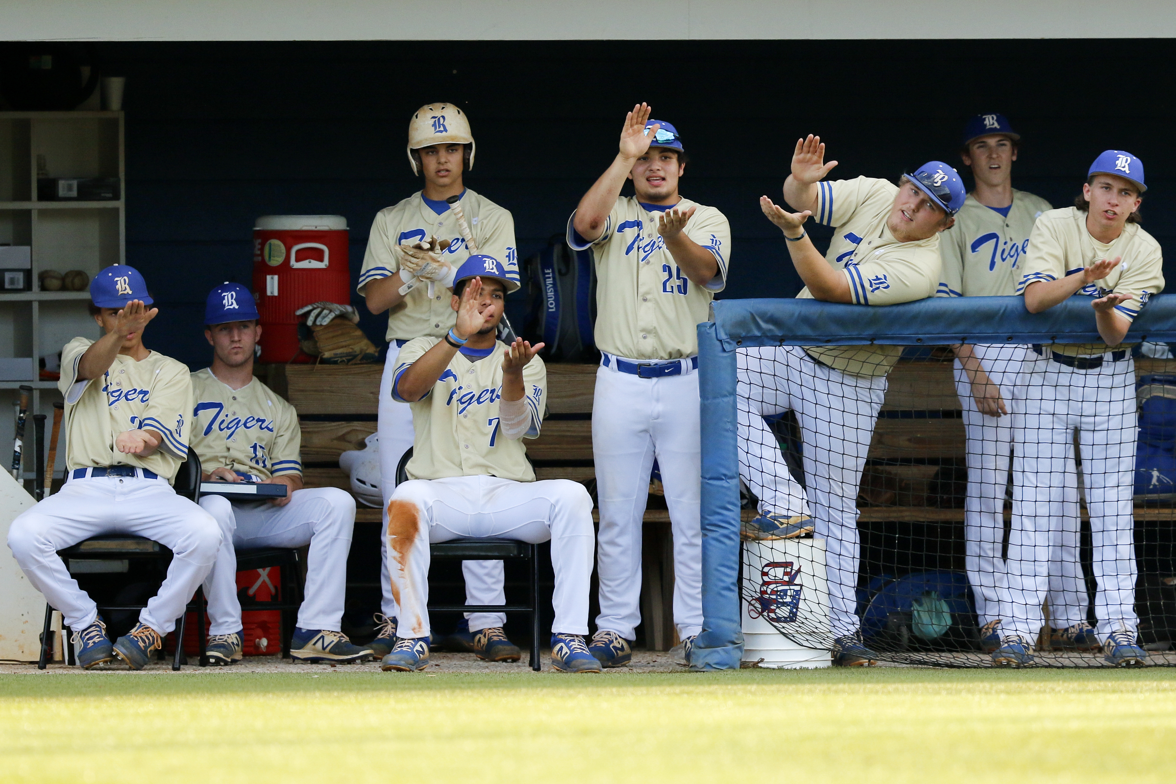 The Ringgold dugout cheers for Sam Mills as he bats during the second game of a double header in the first round of the GHSA playoffs against Cherokee Bluff at Bill Womack Field at Ringgold High School on Wednesday, April 24, 2019 in Ringgold, Ga.