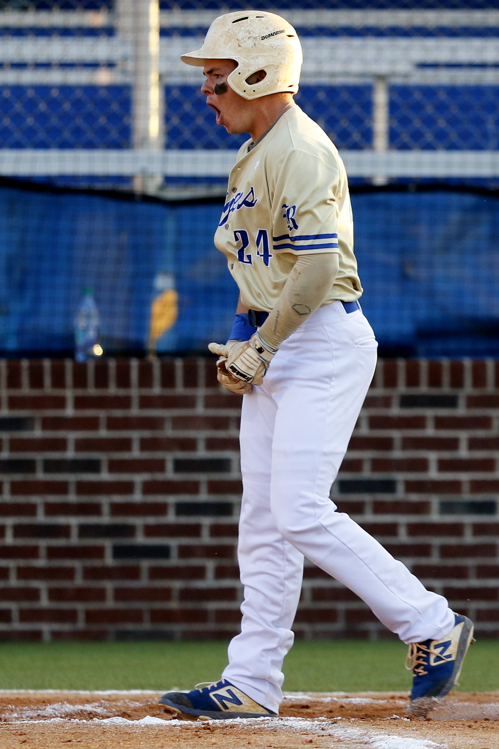 Ringgold's Holden Tucker (24) celebrates after crossing home plate after hitting a solo home run during the second game of a double header in the first round of the GHSA playoffs against Cherokee Bluff at Bill Womack Field at Ringgold High School on Wednesday, April 24, 2019 in Ringgold, Ga.