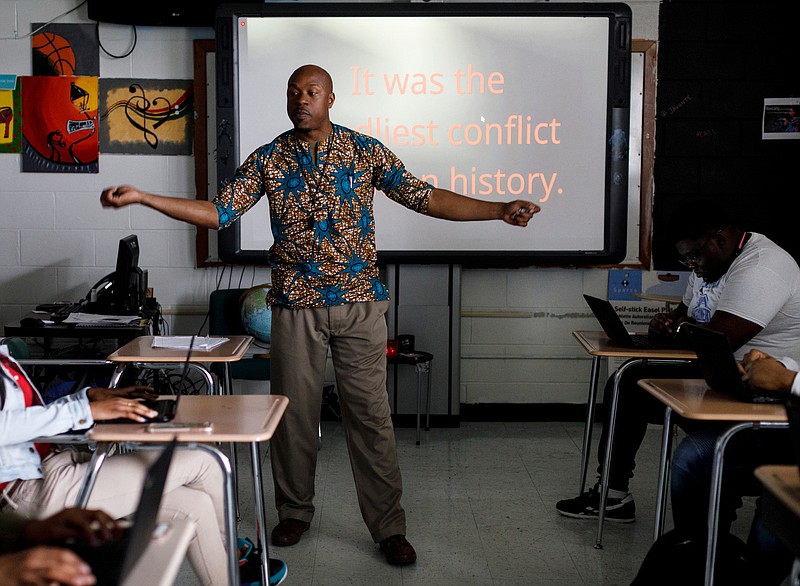 Tyrus Ward teaches American History in his classroom at Brainerd High School on Tuesday, March 26, 2019, in Chattanooga, Tenn. Ward, a Brainerd graduate, is a teacher and also the head football coach.