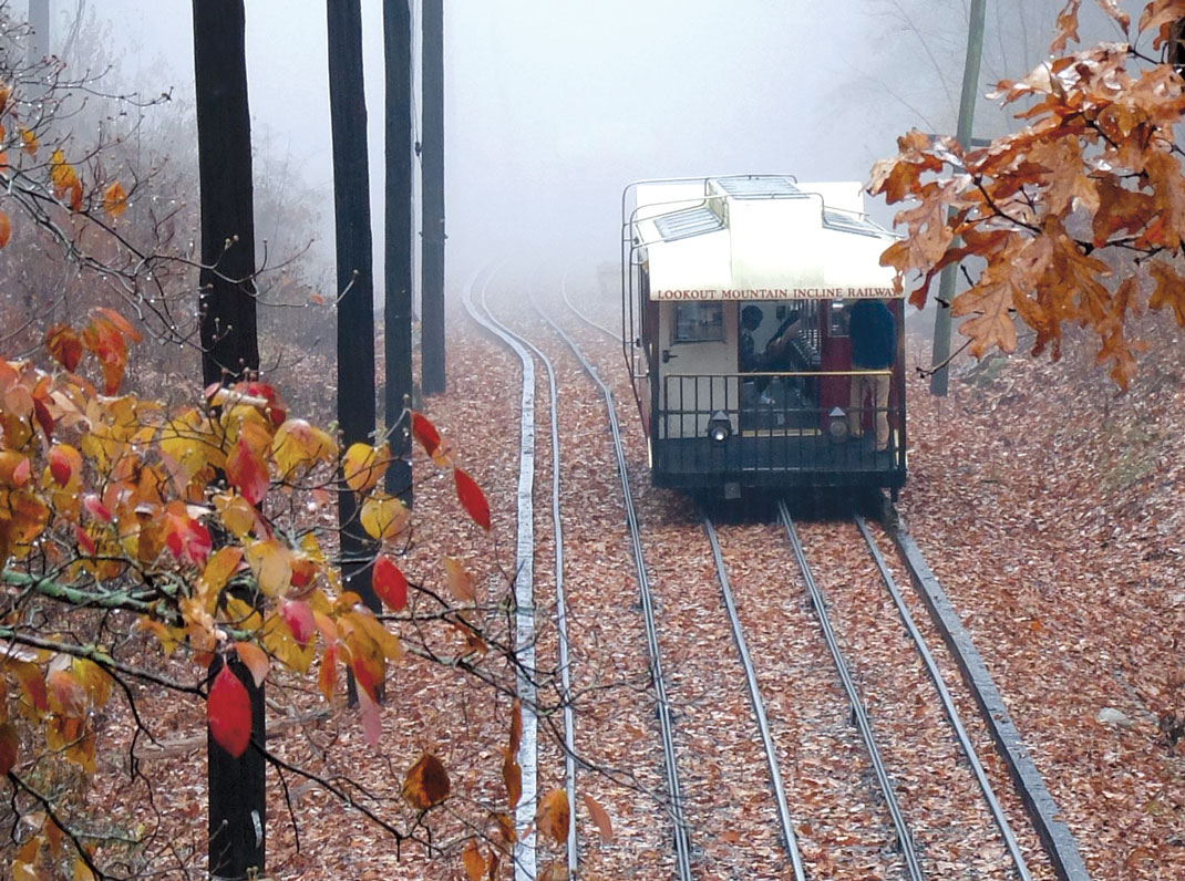 A Lookout Mountain Incline Railway car travels into the fog below the halfway bridge on Scenic Highway.