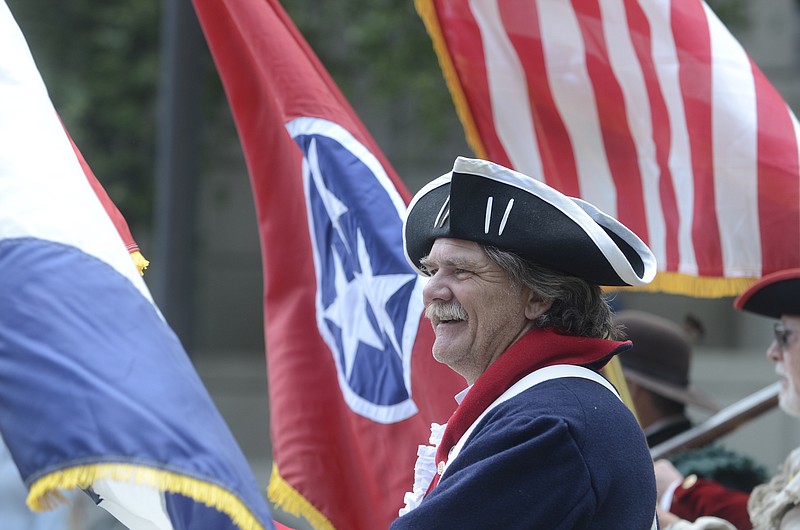James Stone, with the Tennessee Society for Sons of the American Revolution, Benjaman Cleveland Chapter, portrays a Revolutionary War soldier during the 65th annual Armed Forces Day parade in Chattanooga.