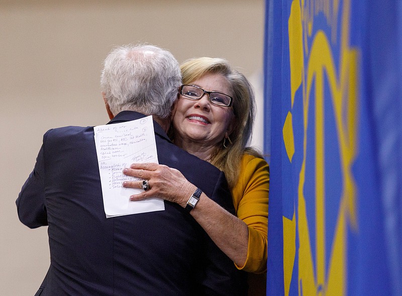 U.S. Sen. Marsha Blackburn, right, hugs former Sen. Bob Corker after he introduced her during a Chattanooga Rotary Club luncheon at the Chattanooga Convention Center on Thursday, April 25, 2019, in Chattanooga, Tenn. Sen. Blackburn said during the speech that Tennesseeans are ready to move on from the Mueller investigation.