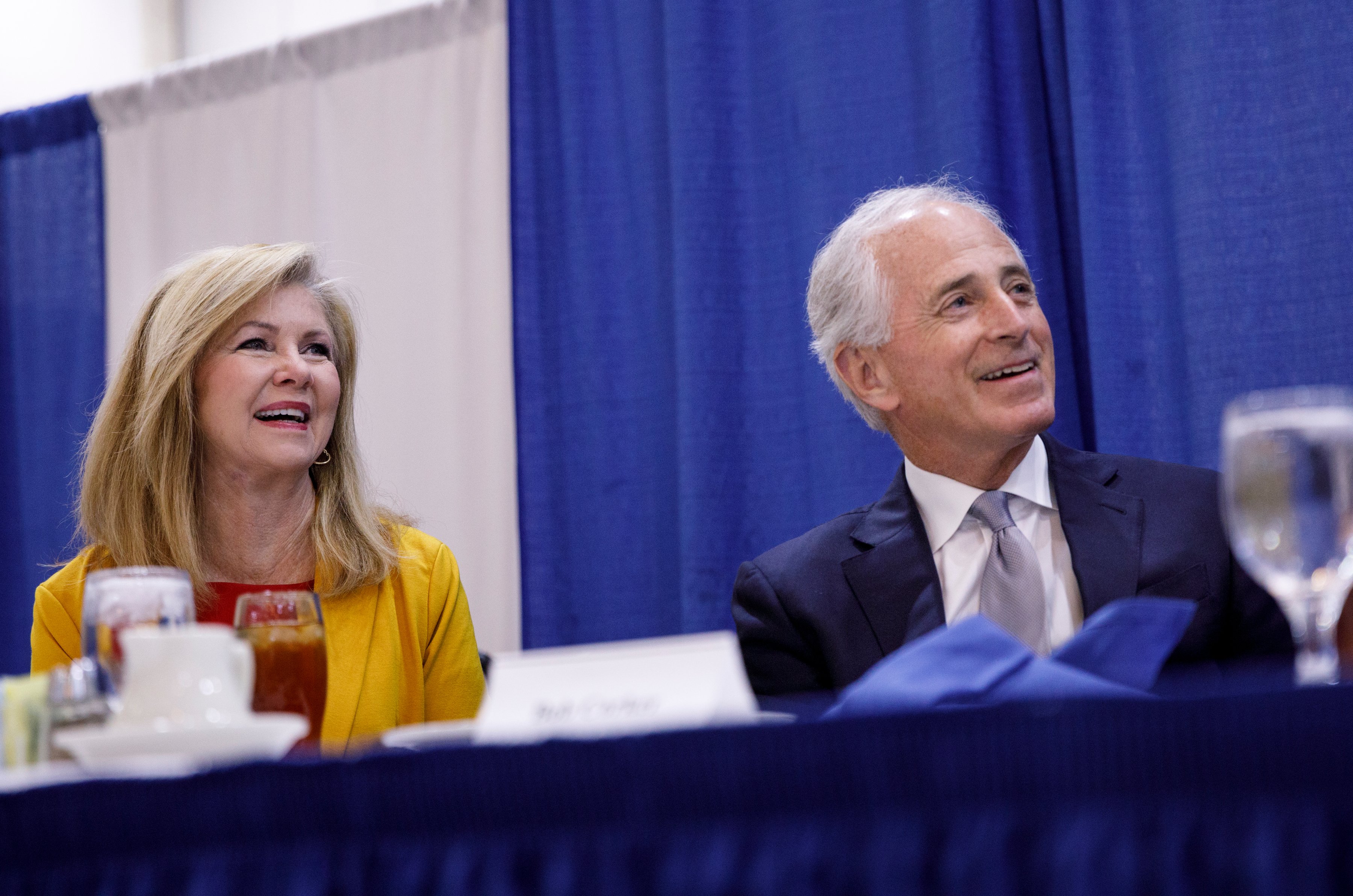 U.S. Sen. Marsha Blackburn, left, sits next to former Sen. Bob Corker during a Chattanooga Rotary Club luncheon at the Chattanooga Convention Center on Thursday, April 25, 2019, in Chattanooga, Tenn. Sen. Blackburn said during a speech that Tennesseeans are ready to move on from the Mueller investigation.