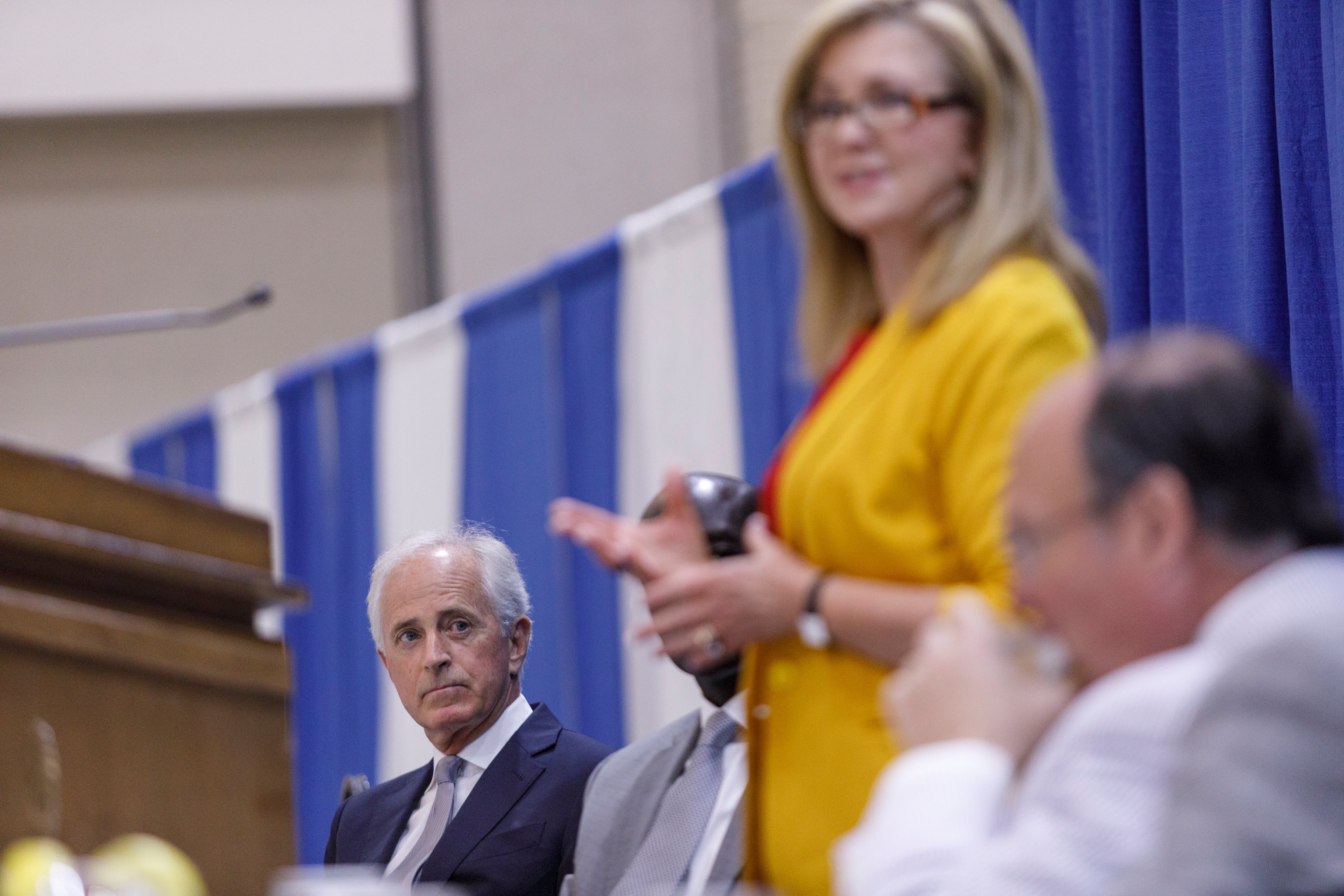 Former U.S. Sen. Bob Corker listens as Sen. Marsha Blackburn speaks during a Chattanooga Rotary Club luncheon at the Chattanooga Convention Center on Thursday, April 25, 2019, in Chattanooga, Tenn. Sen. Blackburn said during the speech that Tennesseeans are ready to move on from the Mueller investigation.