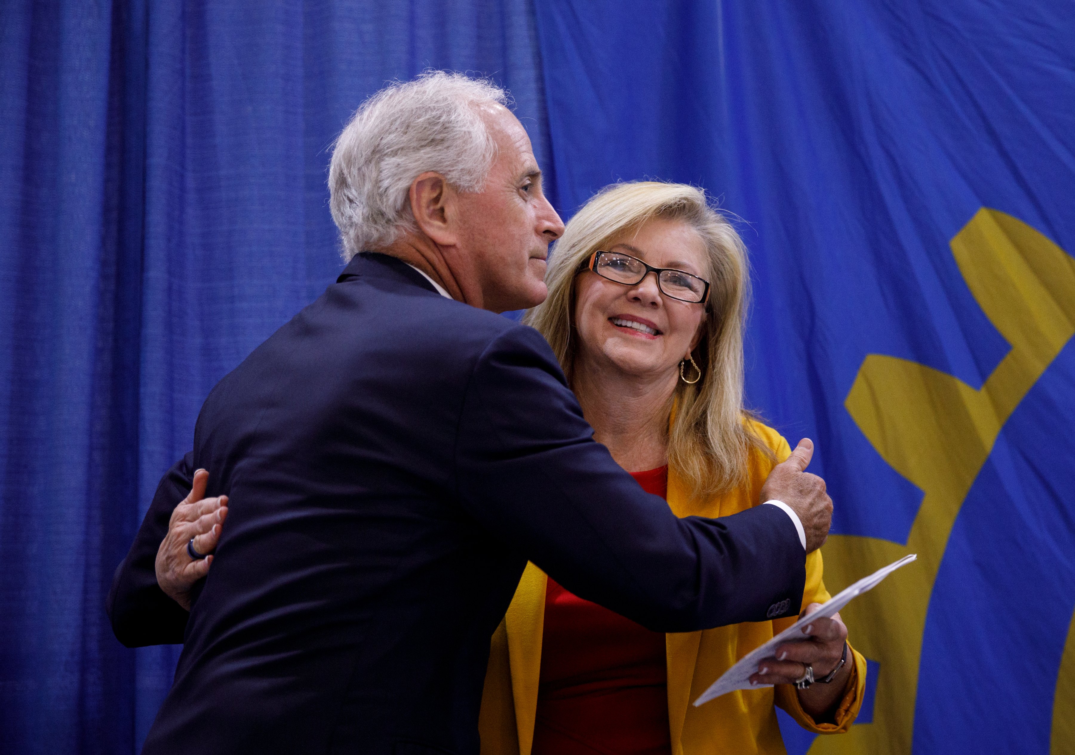 U.S. Sen. Marsha Blackburn, right, hugs former U.S. Sen. Bob Corker after speaking during a Chattanooga Rotary Club luncheon at the Chattanooga Convention Center on Thursday, April 25, 2019, in Chattanooga, Tenn. Sen. Blackburn said during the speech that Tennesseeans are ready to move on from the Mueller investigation.