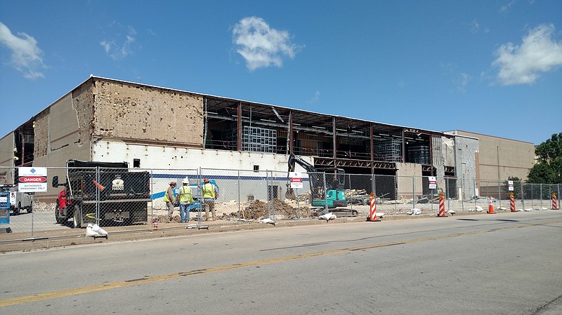 Work is underway at the former Sears store at Hamilton Place mall to ready that space for reuse. A Dick's Sporting Goods store and Dave & Buster's restaurant are among planned new tenants. / Staff photo by Mike Pare