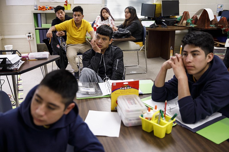 Students listen to an instructor during a NewComer Academy class at Howard School on Tuesday, April 23, 2019, in Chattanooga, Tenn. Howard has launched NewComer Academy to help acclimate new Hispanic students, who comprised nearly 60% of the school's 2019 freshmen class.