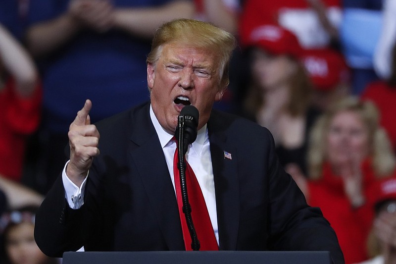 In this March 28, 2019, file photo, President Donald Trump speaks during a rally in Grand Rapids, Mich. Political nerds, start your streaming devices. You've got a big Saturday night of programming ahead. President Donald Trump rolls out his "complete and total exoneration" tour in battleground Wisconsin, his first campaign rally since the release of the Mueller report and an early look at his 2020 re-election strategy.(AP Photo/Paul Sancya, File)
