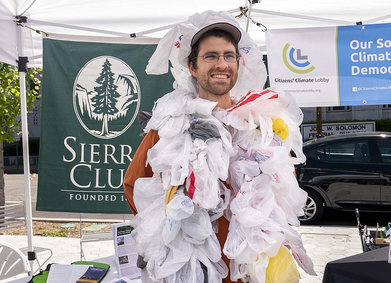 Zach McElrath, the "Plastic Bag Monster," wears 123 plastics bags, which represents the number of plastic bags thrown away every minute, everyday in Chattanooga.
