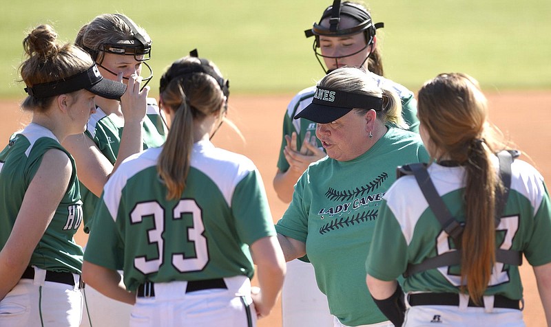 East Hamilton softball coach Norma Nelson, shown with some of her Lady Hurricanes, was presented the Terry Cordell Sportsmanship Award.