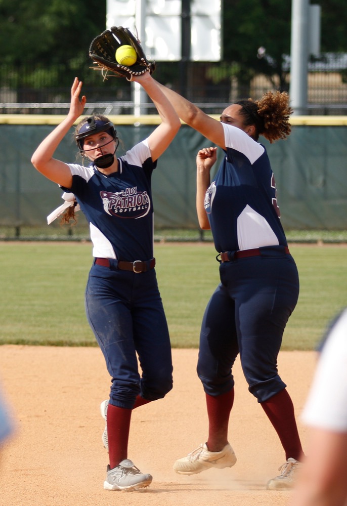 CSAS pitcher Lexie Meyners, left, and first baseman Alaina Thomas nearly collide fielding a fly ball during their prep softball game against Sale Creek at Warner Park on Tuesday, April 30, 2019, in Chattanooga, Tenn.