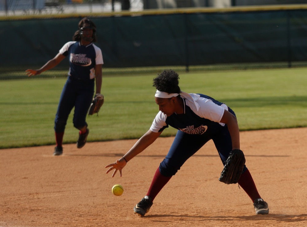 CSAS third baseman Maliyah Mayes bare-hands a grounder during their prep softball game against Sale Creek at Warner Park on Tuesday, April 30, 2019, in Chattanooga, Tenn.