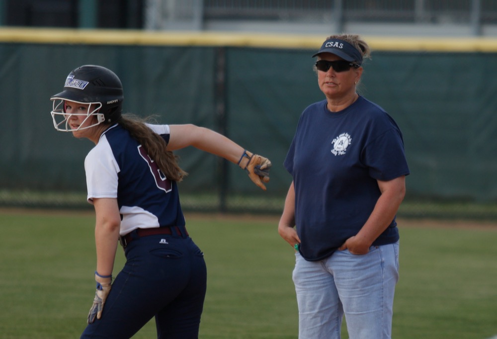 CSAS softball coach Michelle Meyners speaks with runner Ashley Twitty during their prep softball game at Warner Park on Tuesday, April 30, 2019, in Chattanooga, Tenn.