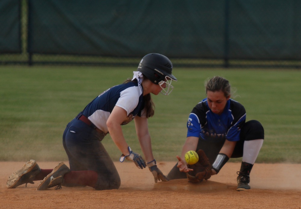 Sale Creek second baseman Leah Campbell tries to keep her glove on the ball after CSAS runner Ashley Twitty slid back to avoid a pickoff during their prep softball game at Warner Park on Tuesday, April 30, 2019, in Chattanooga, Tenn.