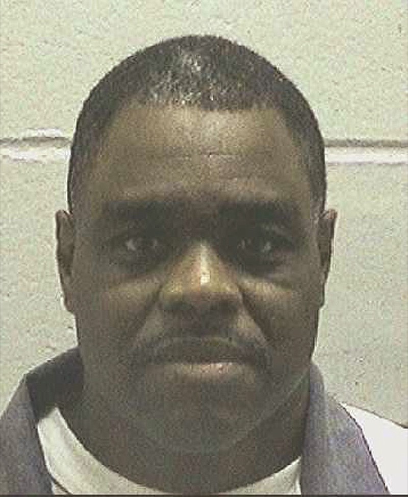 FILE - This undated file photo made available by the Georgia Department of Correction shows Scotty Garnell Morrow, who is set to die Thursday, May 2, 2019. When Morrow killed his ex-girlfriend and her friend nearly 25 years ago, his actions were spontaneous and emotionally fueled and shouldn't be punished by death, his lawyers argue. The State Board of Pardons and Paroles has scheduled a clemency hearing for Wednesday, May 1, 2019, and on Tuesday released a declassified clemency application submitted by Morrow's lawyers. (Georgia Department of Corrections via AP)

